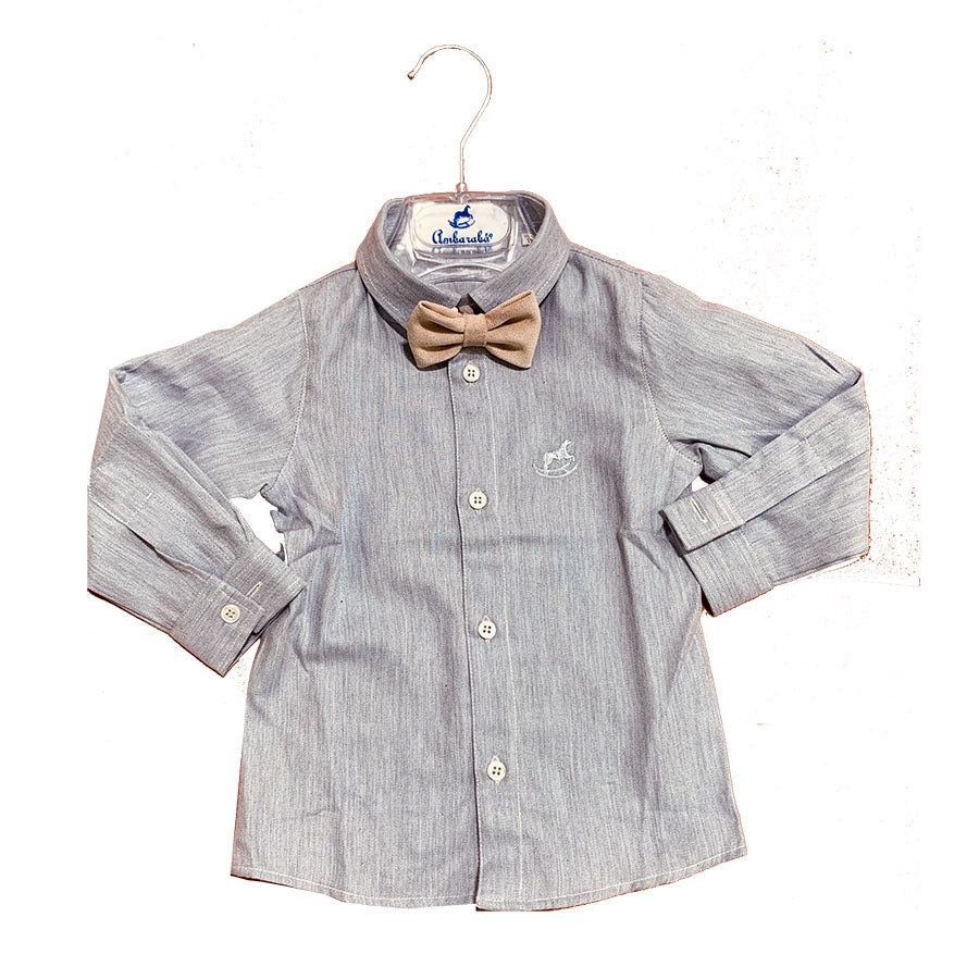 
  Camicia della linea abbigliamento bambino Ambarabà, in bel tessuto morbido a tinta
  unita. Su...