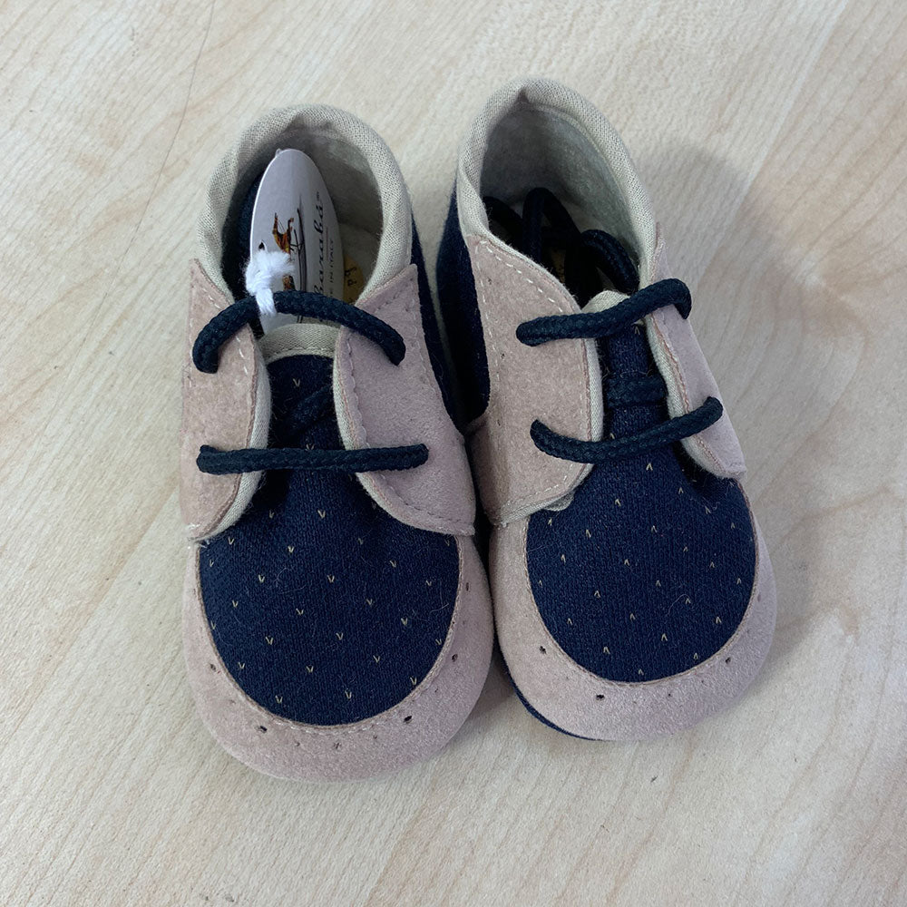 
  Schuhe aus der Ambarabà Kinderkleidungslinie, aus sehr weichen Materialien und
  mit Handwerks...