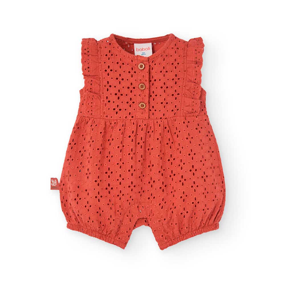 Romper from the Boboli Girls' Clothing Line, with cap sleeves, in solid color lace. At the bottom...