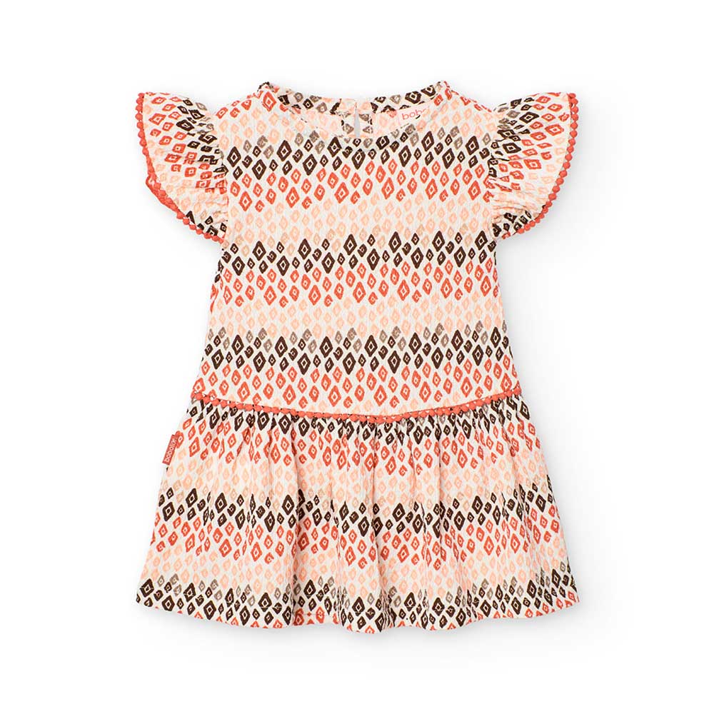 Kleidchen aus der Boboli-Kinderkollektion aus Kreppstoff mit mehrfarbigem geometrischem Muster.

...