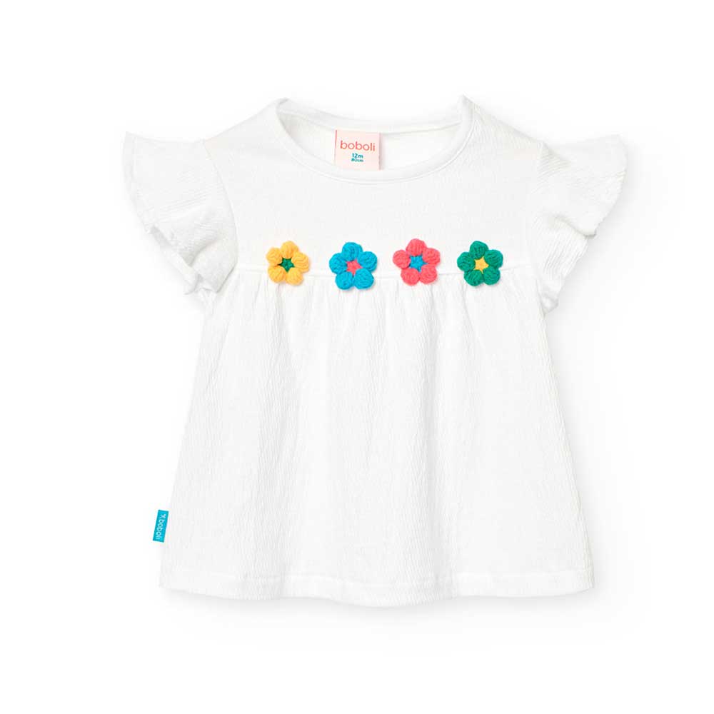 Maglietta della Linea Abbigliamento Bambina Boboli, con fiori multicolor ricamati sul davanti.

C...
