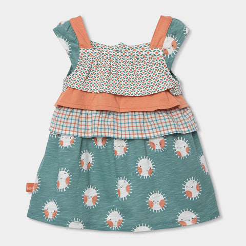 Abito jersey stampato per bambina con balze colorate.