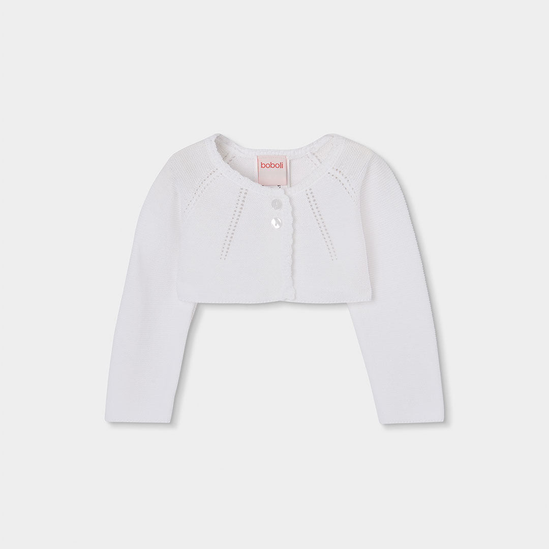 Bolero aus Strick der Kinderkollektion Boboli, mit Knopfverschluss und rundem Ausschnitt.
Komposi...