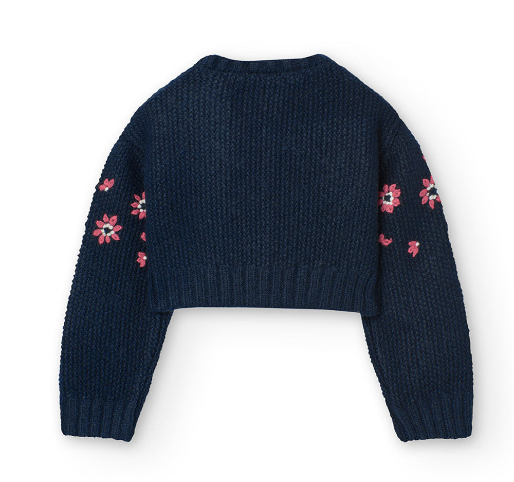 
Kurze Strickjacke aus der Kinderbekleidungslinie Boboli, mit gestickten Blumen auf der Vordersei...