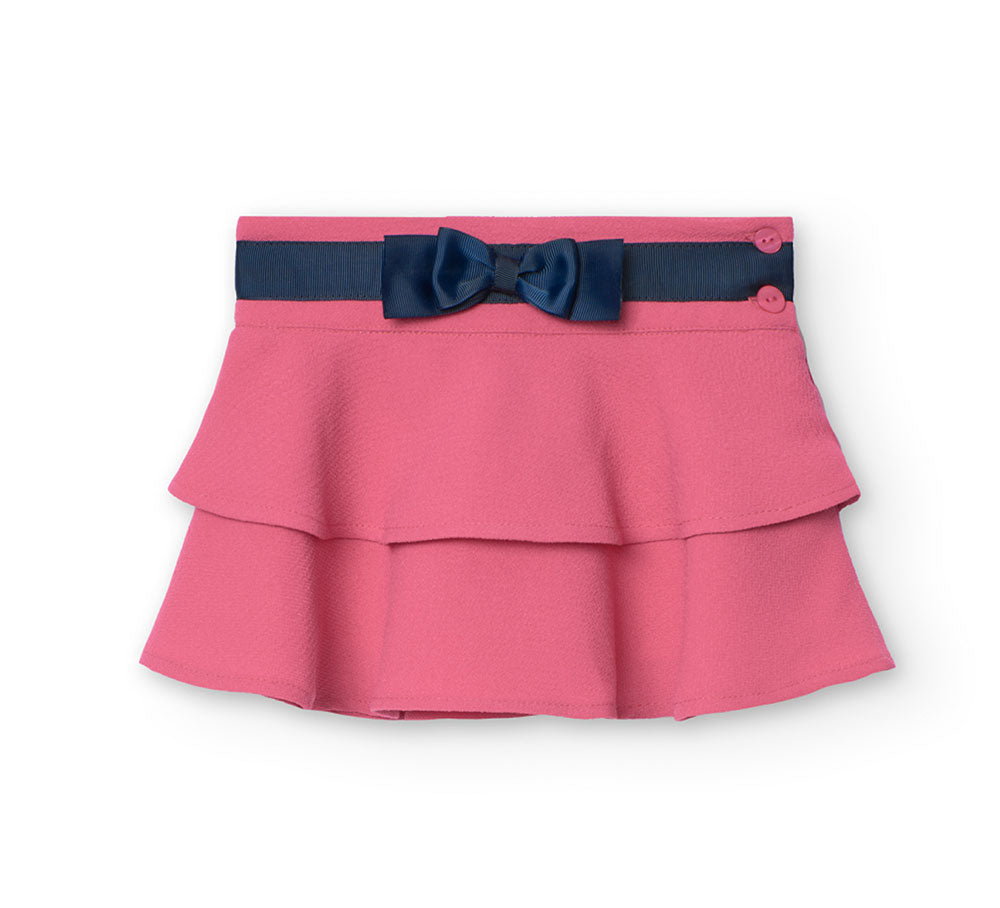 
Rock aus der Kinderbekleidungslinie Boboli, mit Volants, einer Schleife in der Taille und einem ...