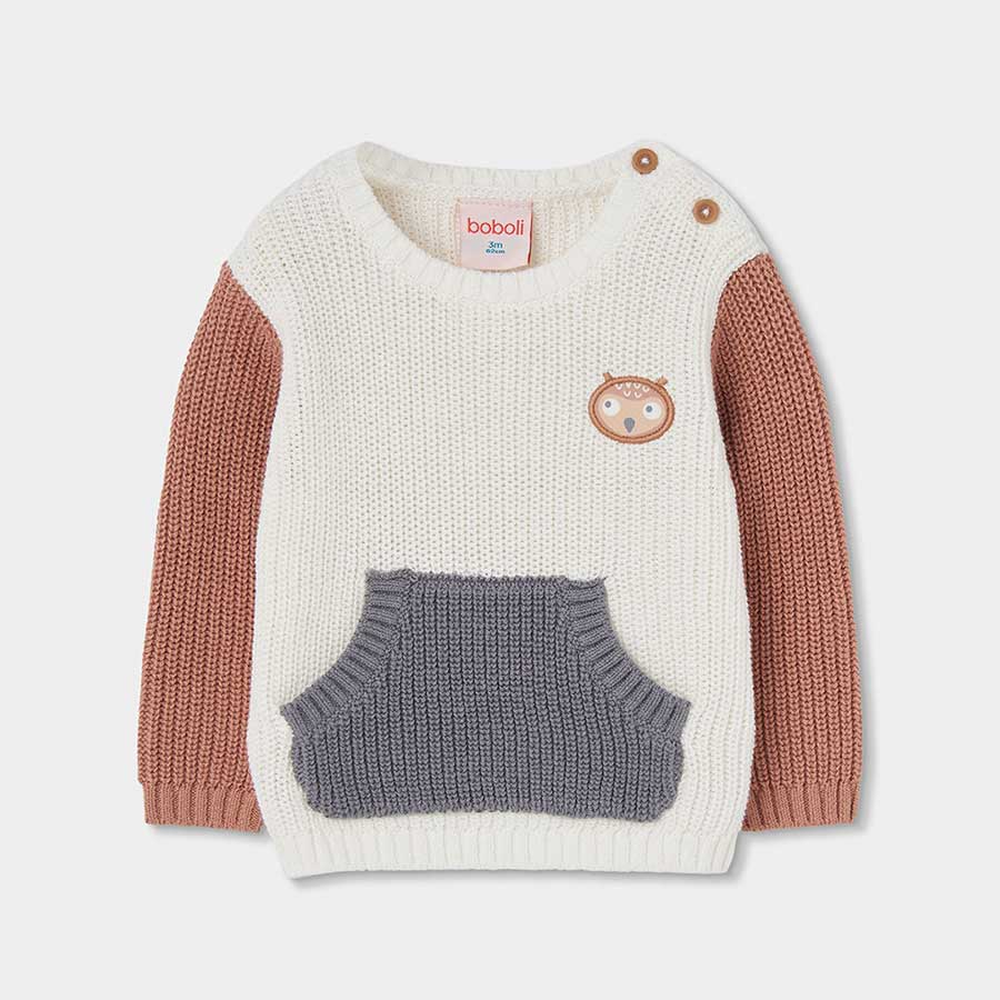 Hülle dein Kleines in eine warme Umarmung mit diesem farbenfrohen Langarmpullover, perfekt für di...