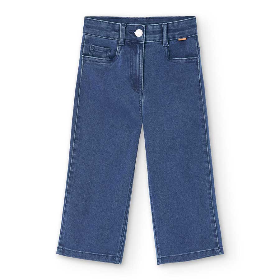 Questi pantaloni denim a zampa uniscono stile e comfort per la tua bambina, perfetti per le giorn...