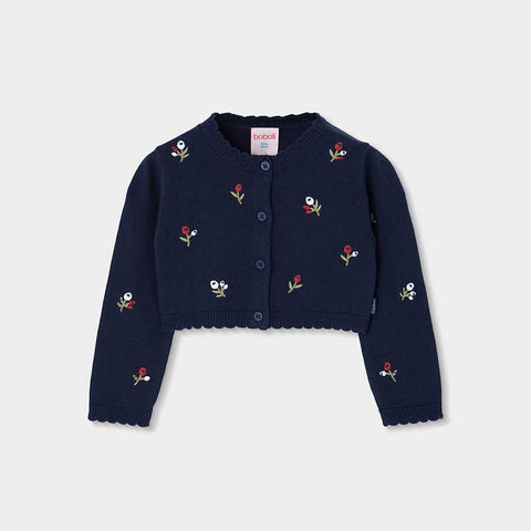 Cardigan corto blu navy con ricami floreali rossi e bianchi, bottoni frontali e bordo smerlato