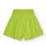 Bermuda ampi fluo per bambina, con una fascia elastica in vita.