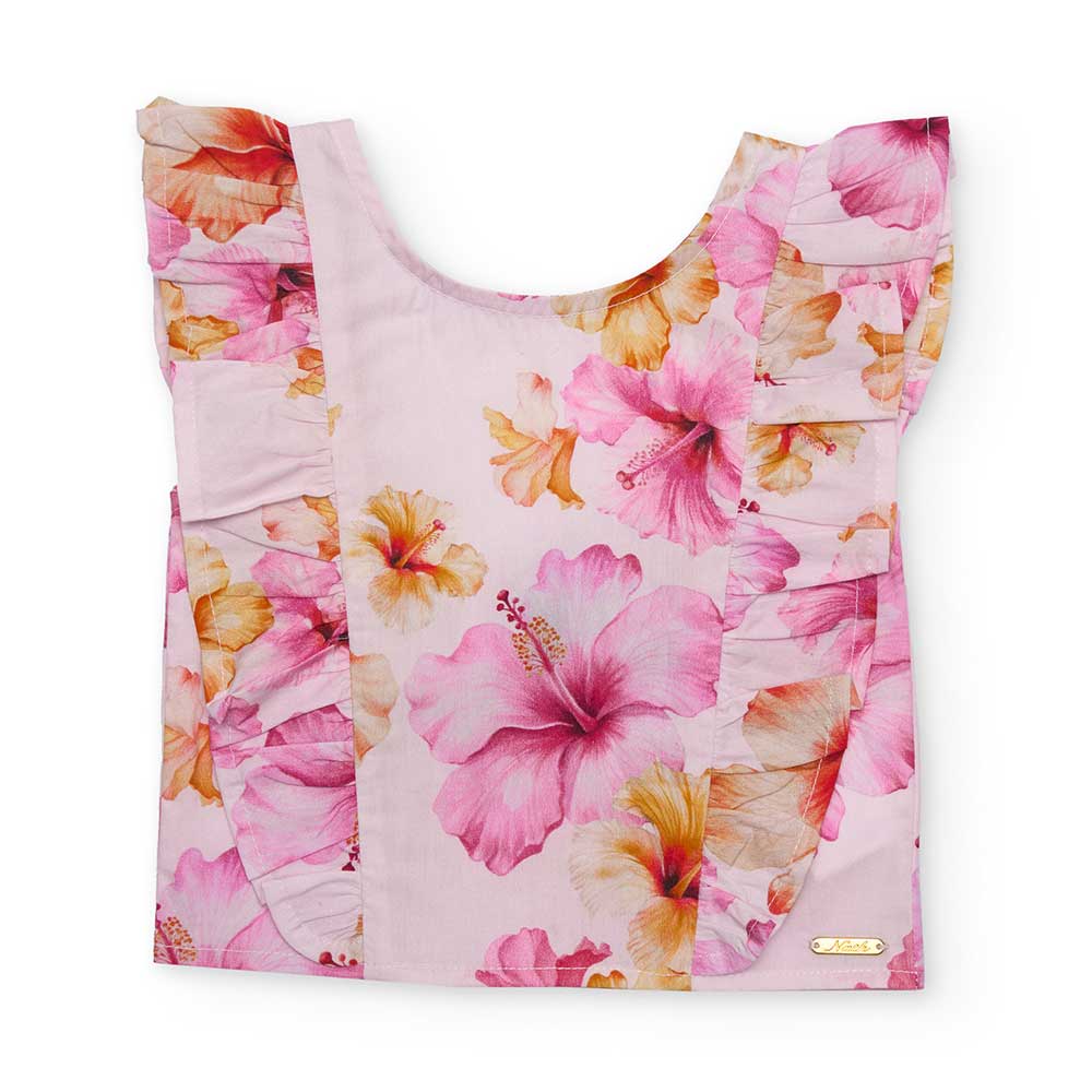 Questa blusa con rouche è l'ideale per le giornate primaverili ed estive della tua bambina. Il de...