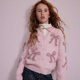 STRICKJACKE MIT SCHLEIFEN