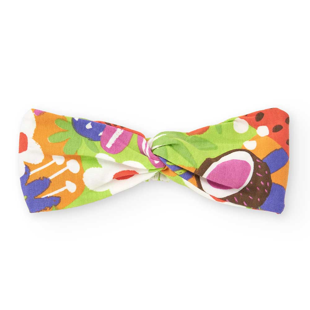 Stirnband aus der Tuc Tuc Girls' Clothing Line, mit mehrfarbigem tropischem Muster.
Zusammensetzu...