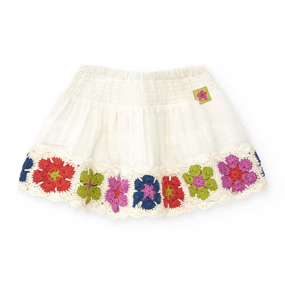 Rock der Kinderbekleidungslinie Tuc Tuc, weit geschnitten mit einer Applikation aus gestricktem B...