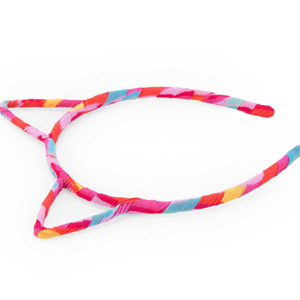 Headband from the Tuc Tuc Girls' Clothing Line.
Composition: Iron 60%, Polyester 40%.