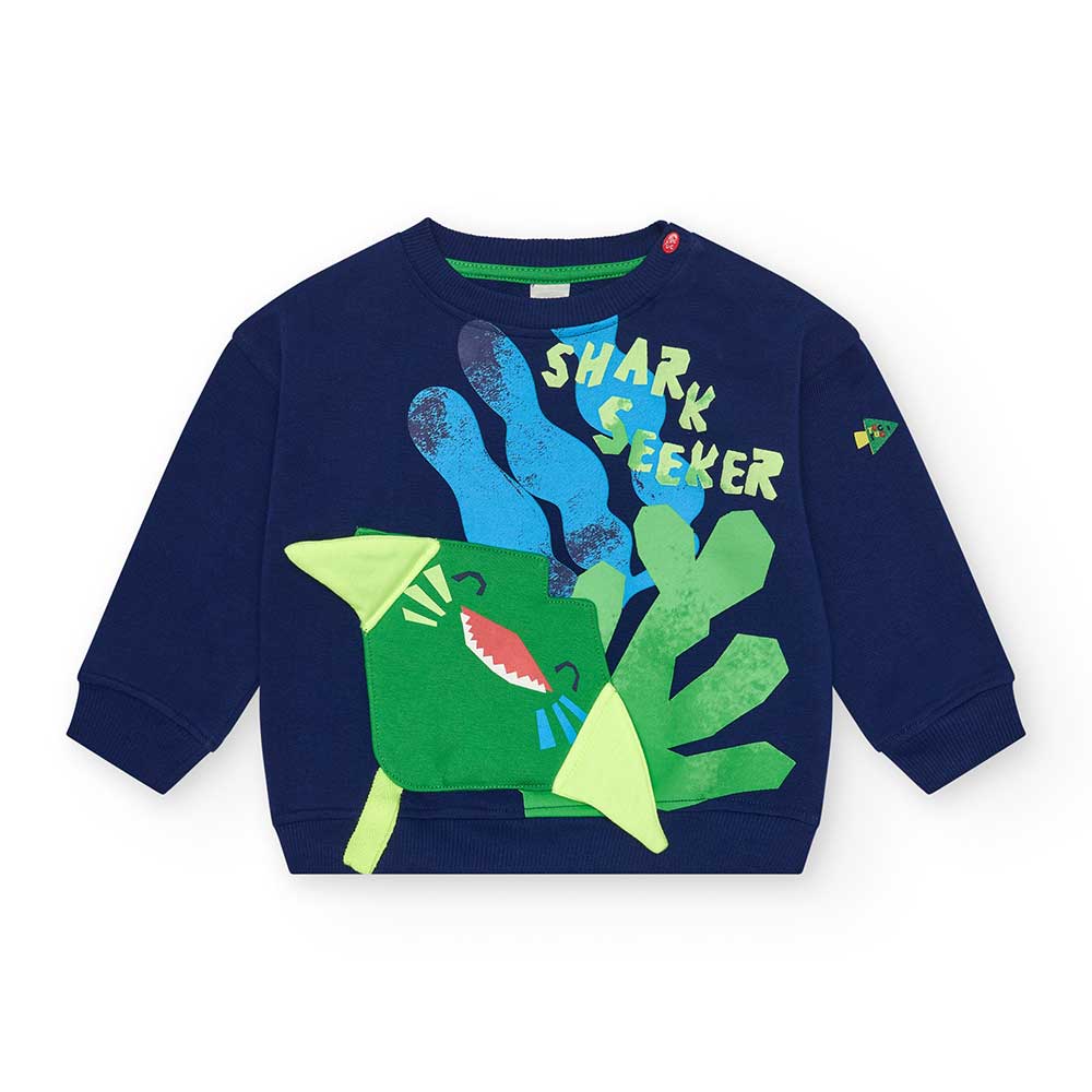 Genähtes Sweatshirt aus der Tuc Tuc Kinderbekleidungslinie, mit farbigem Druck auf blauem Grund.
...