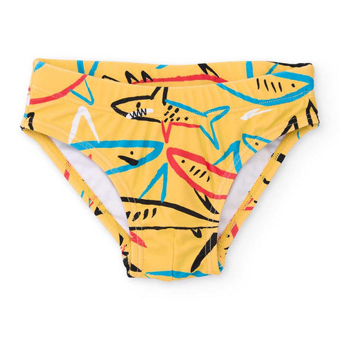 Costume da bagno giallo con squali colorati per bambini.