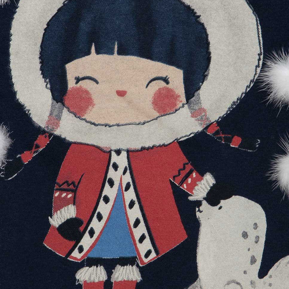 
T-Shirt aus der Tuc Tuc Clothing Line, mit aufgesetzten Bommeln auf der Vorderseite und Druckknö...