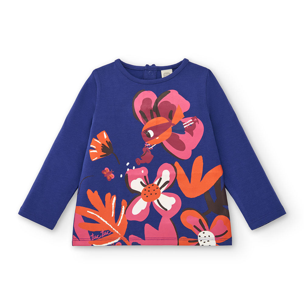 Tuc Tuc Girl's Clothing Line T-shirt, with a floral print in bright colors on an electric blue ba...