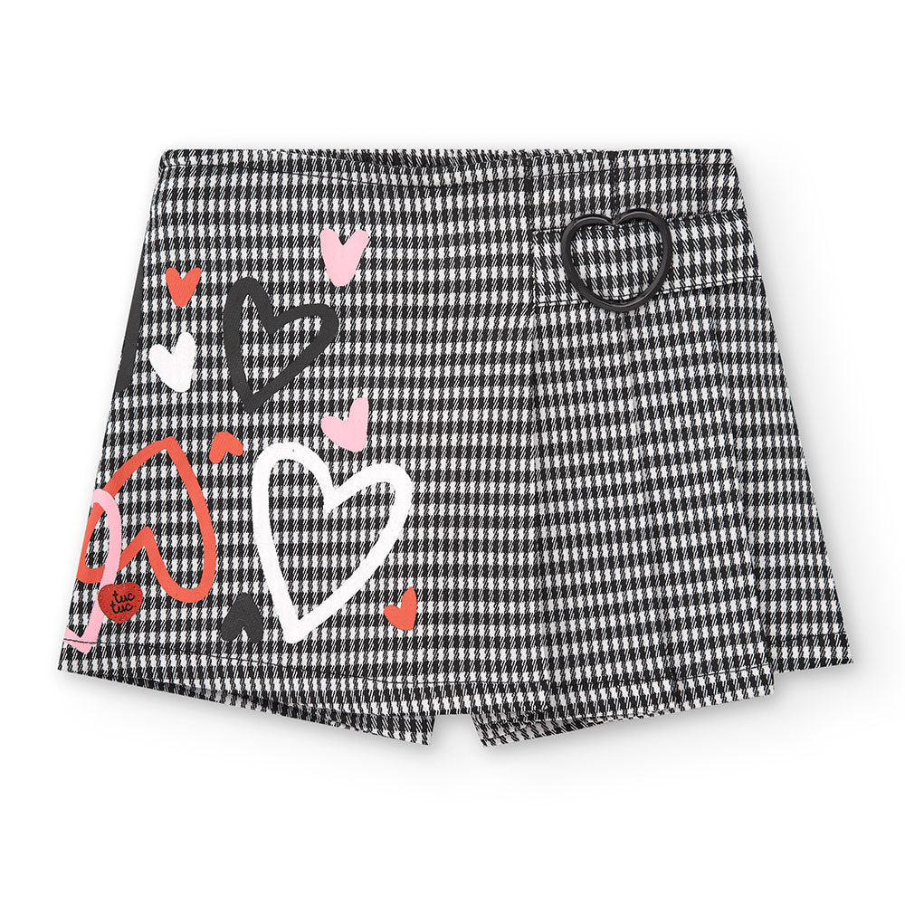 Rock mit Shorts aus der Kinderbekleidungslinie Tuc Tuc, mit kariertem Muster und Taillenschnalle....