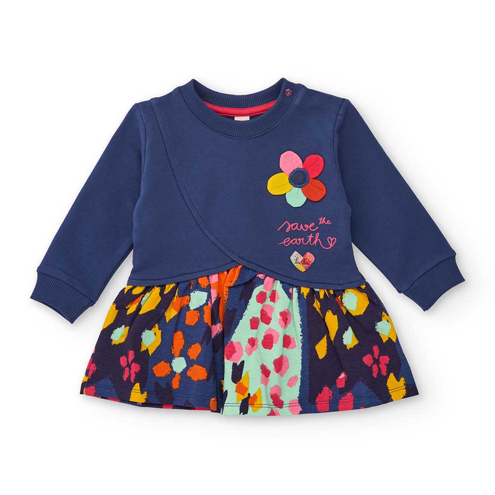 Kleid aus der Kinderbekleidungslinie Tuc Tuc, mit weitem gemustertem Rock und einfarbigem Obertei...