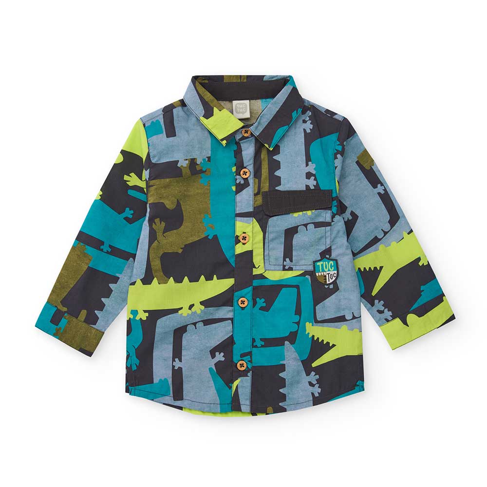 Hemd aus der Kinderbekleidungslinie Tuc Tuc, mit einem Allover-Krokodilmuster.
Zusammensetzung: 1...