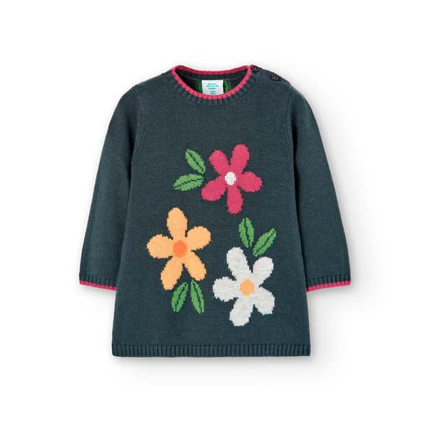 
Strickkleid aus der Boboli-Kinderkollektion, mit Knöpfen auf einer Seite und buntem Blumenmuster...
